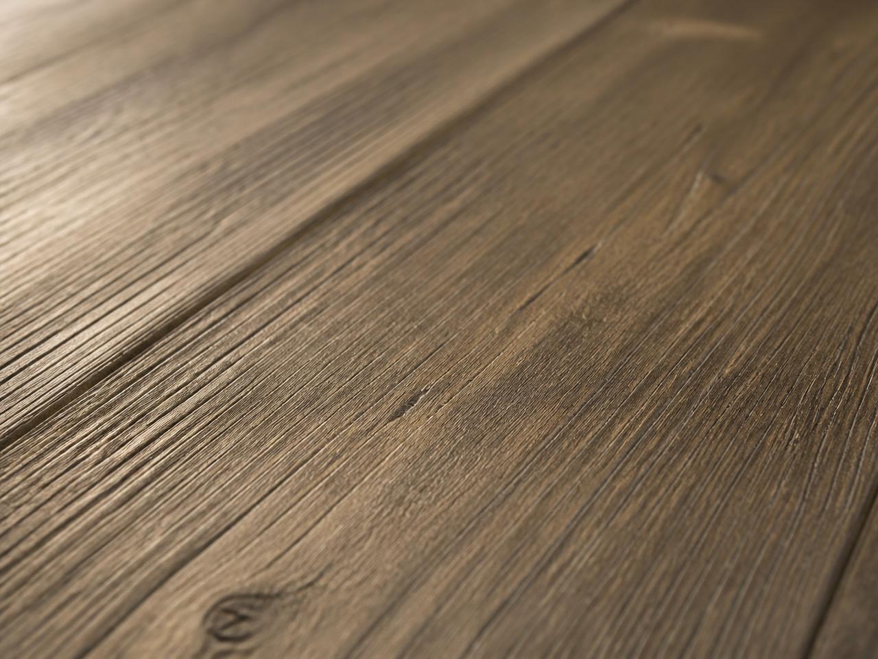 Close-up of a wire-brushed and prefinished wood plank surface